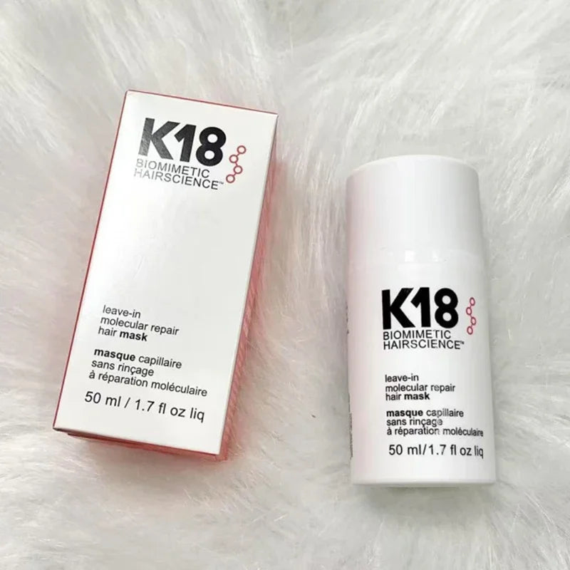 Applying K18 leave-in molecular repair mask on towel-dried hair