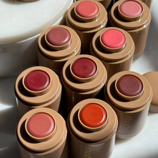 Rhode Juice Box cream blush swatch showing vibrant pink tone