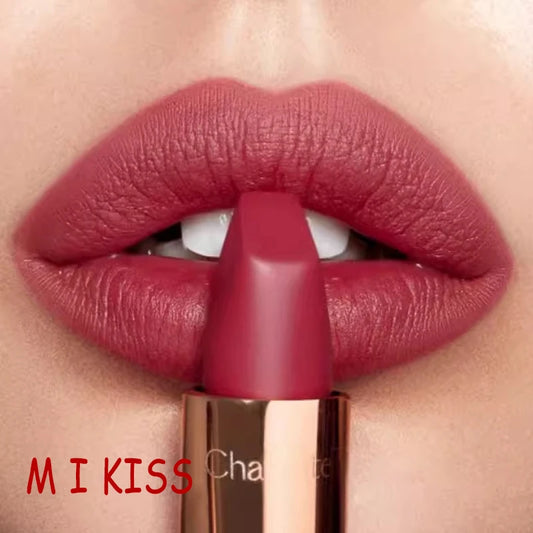 Close-up of a red lipstick being applied to lips with 'MI KISS' branding.