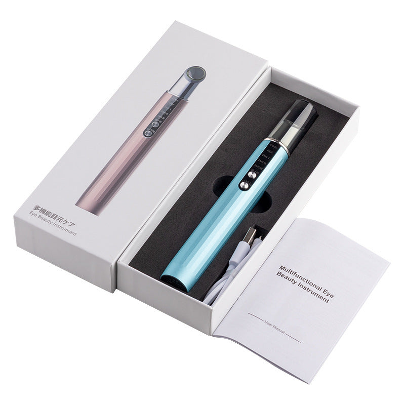 Close-up of electric eye massager showing hot and cold functions for under-eye care and relaxation