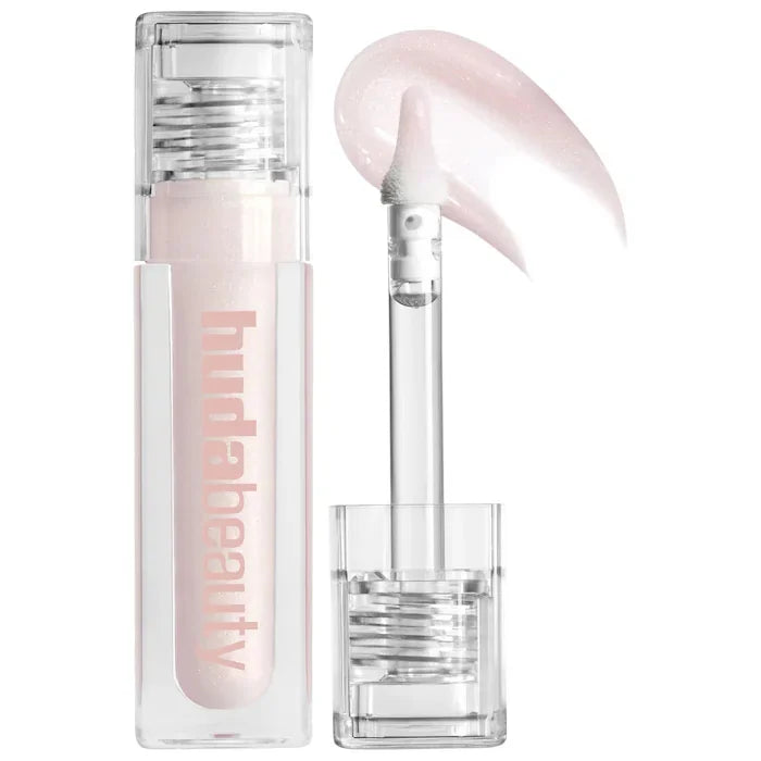 Lip gloss with applicator and 'huda beauty' branding on a white background