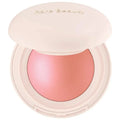 Compact blush with pink shade and 'Rare Beauty' branding on a white background