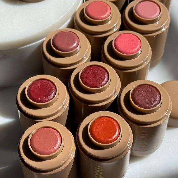 Rhode Juice Box cream blush swatch showing vibrant pink tone