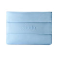 Light blue make up bag with 'rhode' branding on a white background