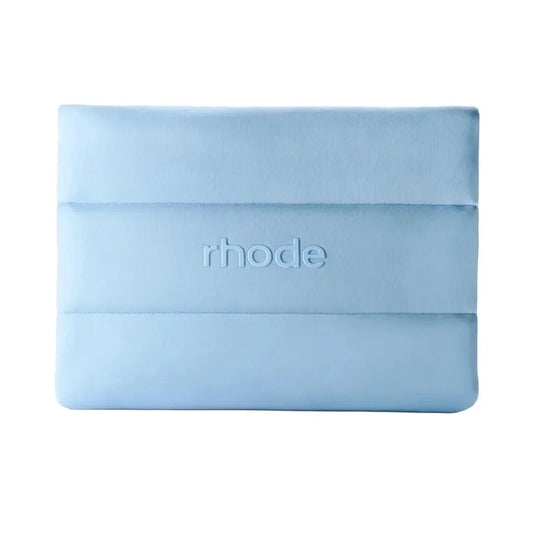 Light blue make up bag with 'rhode' branding on a white background