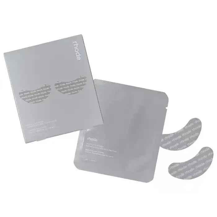 Gray eye mask packaging with 'rhode' branding on a white background