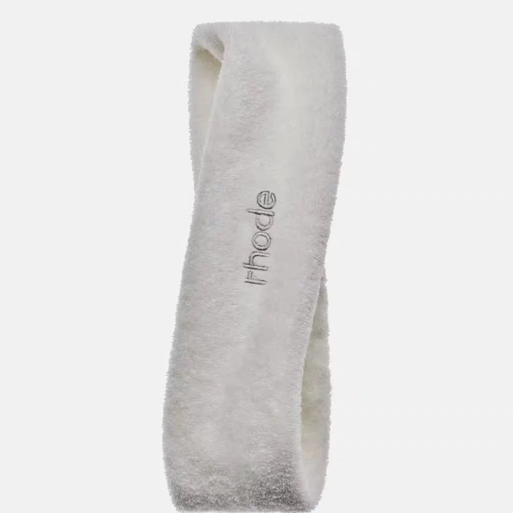 Gray headband with 'rhode' branding on a white background