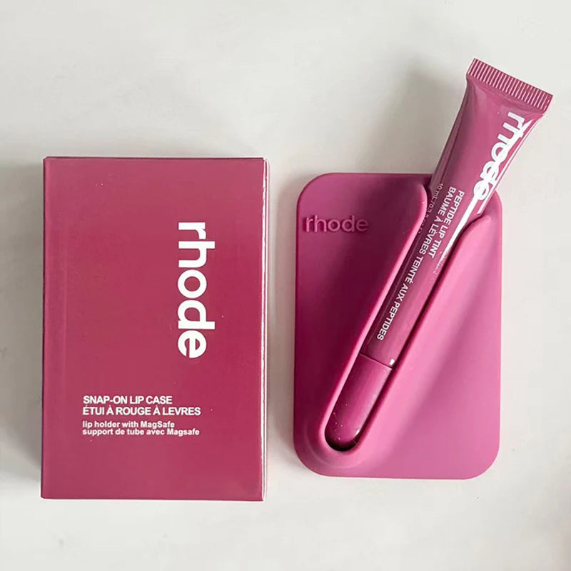 Pink lip case with lip balm and packaging on a white background