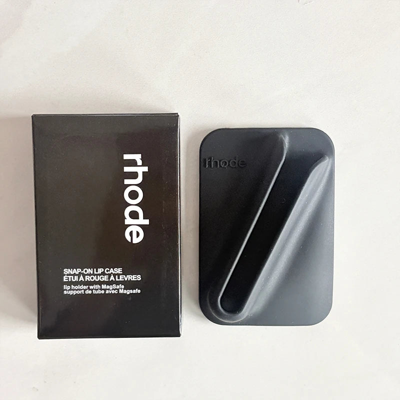 Black 'rhode' lip case and packaging on a white background