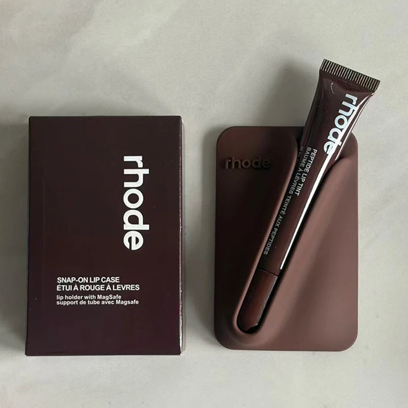 Brown lip case with 'rhode' branding on a light gray background